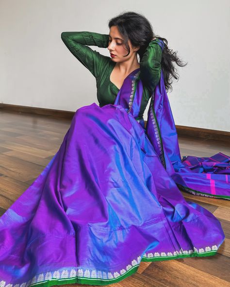 Desi core Aesthetics 🦚🦢🛺| Save these saree poses for the next time you need a how to pose for saree inspo ✨ Constantly struggling between a low bun or open hair so you decide. Pure silk saree of the day- is a mulberry banarasi in dual toned bluish purple base contoured with emerald green borders and magenta lines on the pallu. #fyp #explore #iwearhandloom #handloomlove #puresilksaree #sareestyling #sareeindia #sareeinfluencer #sareeposes #howtopose #poseideas #archeedrapes Saree Drapes, Core Aesthetics, Open Hair, Bluish Purple, Saree Poses, Open Hairstyles, Arabian Beauty Women, Arabian Beauty, Pure Silk Saree