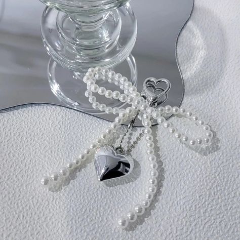 Handmade Pearl Bow Keychain 12.00 and FREE Shipping | Tag a friend who would love this! | Active link in BIO #hashtag7 #hashtag8 #hashtag9 #hashtag10 #hashtag11 #hashtag12 Bow Keychain, Bead Earring, Pearl Decorations, Pearl Bow, Heart Key, Shipping Tags, Heart And Key, Heart Keychain, Handmade Bows