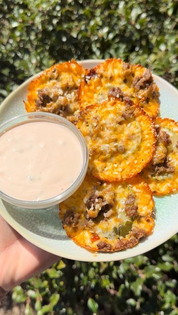 Kristy Hawk on Instagram: "Big Mac Bites These were absolutely delicious and filling. 🍔 I dipped them in my Sugar Free Thousand Island Dressing which can be found in my Cookbook and meal plans as well as on my page. www.Kristysketolifestyle.com/shop RECIPE - Makes 12 bites INGREDIENTS: 6 oz freshly shredded cheese (I used Kraft Monterey Jack Cheddar Blend 12 dill pickle chips 6 Tbsp cooked hamburger sesame seeds STEPS: 1. Preheat oven to 375 degrees Fahrenheit. 2. Set the pickle chips on a paper towel and blot out some of the moisture. 3. Put half of the shredded cheese in each circle of a muffin top pan. 4. Place a pickle on each cheese circle and then add about 1/2 Tbsp of the cooked hamburger meat to each one. 5. Top them all with the remaining cheese and sesame seeds. 6. Big Mac Bites, Mac Bites, Meaty Appetizers, Muffin Top Pan, Dill Pickle Chips, Thousand Island, Pickle Chips, Thousand Island Dressing, Hamburger Meat