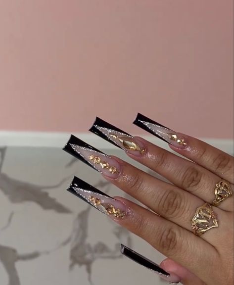 Black And Gold Bling Nails, Black Long Nails Acrylic, Black And Gold Acrylic Nail Designs, Black Latina Nails, Black Buchona Nails, Grey Black Nails, Black N Gold Nails, Black And Gold Nails Acrylic, Black Bling Acrylic Nails