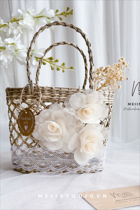 "Discover the perfect Flower Girl Baskets for your special day. Whether you're planning a rustic, dreamy, beach, fall, winter, boho, vintage, or minimalist wedding, you'll find the ideal basket to match your theme. Explore boho wedding ideas and latest 2023 wedding trends to find the perfect complement to your flower girl's look. Make your wedding unforgettable with a beautiful flower girl basket." Diy Flower Girl Basket, Confetti Basket, 2023 Wedding Trends, Wedding Ideas Rustic, Flower Girl Basket Rustic, Boho Wedding Ideas, Dreamy Beach, Rustic Flower Girls, Unique Wedding Ideas