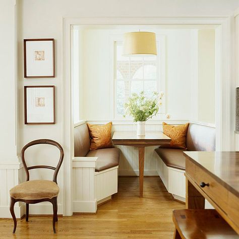 Breakfast Booth  Consider borrowing square footage from spaces adjacent to your kitchen to create a new breakfast nook. These homeowners turned an inefficient laundry room into a comfortable breakfast nook. Booth seating is a good option for small, recessed rooms such as this. The angled seating not only adds style but also makes it easier to get in and out of the booth. Ikea Breakfast Nook, Kitchen Booth, Banquette Ideas, Kitchen Booths, Breakfast Nook Table, Nook Table, Kitchen Breakfast Nooks, Built In Banquette, Kitchen Banquette