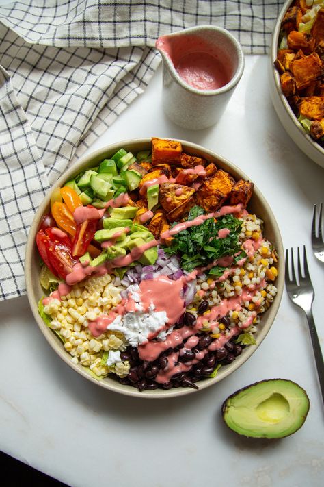 this is a vegan eat the rainbow bowl. this plant-based eat the rainbow bowl is a food version of the phrase eat the rainbow. it’s packed with colorful and healthy ingredients of the rainbow Vegan Rainbow Salad, Sweet Potato And Black Beans, Rainbow Food Ideas, Plant Based Salads, Vegan Breakfast Bowl, Protein Vegan Meals, High Protein Vegan Meals, Raspberry Dressing, Rainbow Diet