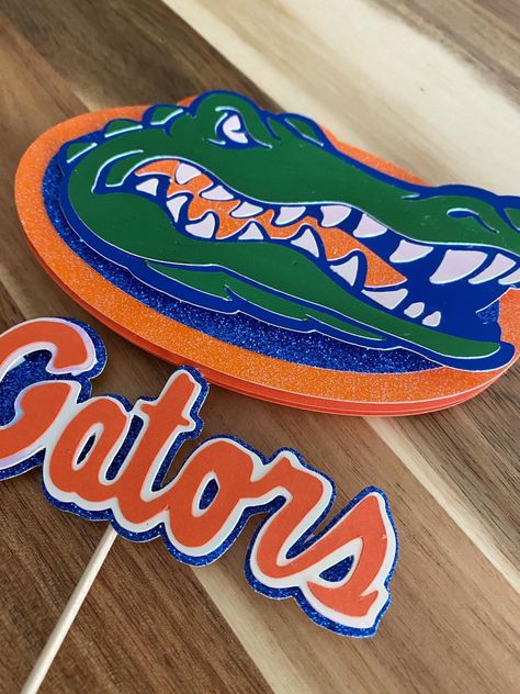 Florida Gators Party, Gator Party, Ferrari Party, Senior Table, Surprise 60th, Cricket Ideas, Florida Gator, Shark Birthday Party, Video Game Party