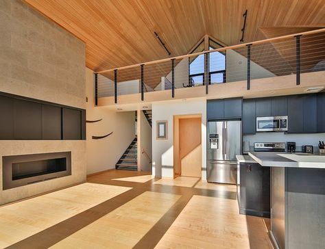 Photo 7 of 14 in Alaska Surf Shack by Studio Zerbey Architecture & Design - Dwell Loft Above Kitchen, Modern Surf Shack, Ski Lodge Interior, Fireplace Photo, Loft House Design, Seward Alaska, Cozy Loft, Light Hardwood, Light Hardwood Floors