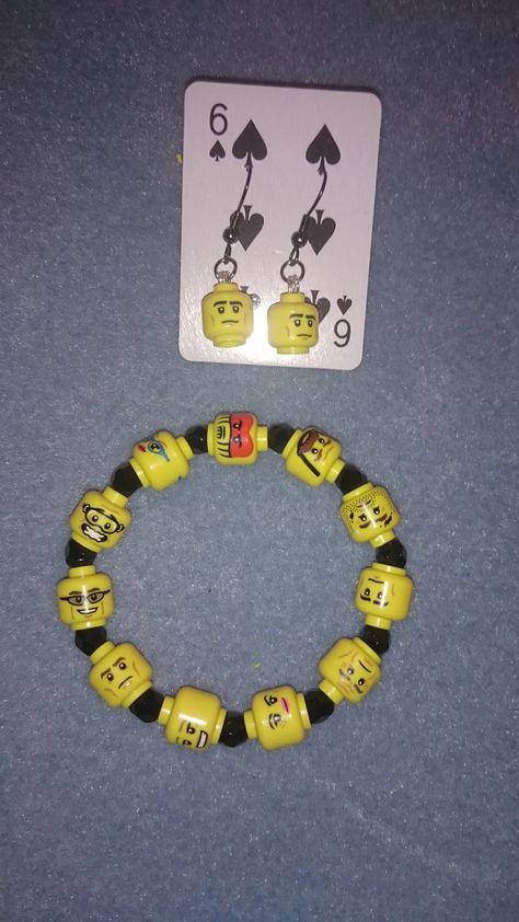 I had a bunch of broken Lego Minifigures, even though some were missing an arm and a leg it seemed a shame to throw them away so I decided to have a go at making an elasticated bracelet and matching pair of quirky matching earrings. Mf Doom Bracelet, Unhinged Bracelet Ideas, Lego Bracelet, Lego Jewelry, Diy Sale, Diy Kandi Bracelets, Lego Diy, Lego Craft, Lego Party