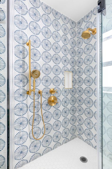 This kid’s bath is a fun and lively space that sparks joy and creativity. The shower wall is adorned with sunburst-shaped blue tiles, adding a touch of whimsy and energy. #subwaytile #bluebathroom #kidsbath #kidsbathroom #moroccanthemebath #moroccaninspireddesign #interiordesign #brassfixtures

https://www.studio790.com/post/casablanca-cool-a-contemporary-moroccan-design-in-the-heart-of-coral-gables Bathroom With Bench, Moroccan Tile Bathroom, Mediterranean Bathroom, Miami Interiors, Miami Interior Design, Guest Bathroom Remodel, Moroccan Theme, Moroccan Tiles, Boys Bathroom