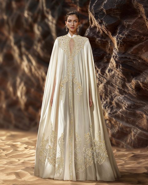 ​Our triple georgette kaftan, adorned with a cascade of silver and gold embellishments, is a testament to exquisite craftsmanship. ​​ #SaiidKobeisy​​ #Kaftan​ #HauteCouture Royal Dinner, Georgette Kaftan, Saiid Kobeisy, Kaftan Designs, Kaftan Style, Exquisite Gowns, Gold Embellishment, Bridal Inspo, Full Length Dress