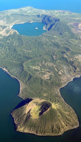 Lake Taal is located on the island of Luzon in the Philippines. Within that lake you’ll find Taal Volcano, and atop that volcano you’ll find yet another lake. Incredible. Taal Lake Philippines, Philippines Wallpaper, Luzon Philippines, Taal Volcano, Tagaytay, Philippines Travel, Biome, Archipelago, Pacific Ocean