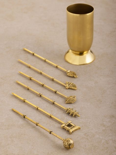 Set the scene for an unforgettable experience with the Magnolia Cocktail Picks, expertly crafted from stainless steel with a stunning matte gold finish. Each pick is adorned with a design inspired by the serene Buddhist culture, reflecting the serene beauty of ancient artistry. As you serve your signature cocktails or appetizers, these picks become more than just tools—they are gateways to far-off lands and rich traditions. Elevate your gatherings with the Magnolia Cocktail Picks, where every bi Bedroom Picture Frames, Wine Cake, Cocktail Picks, Signature Cocktails, Going For Gold, Signature Cocktail, Matte Gold, Mild Soap, Tray Decor