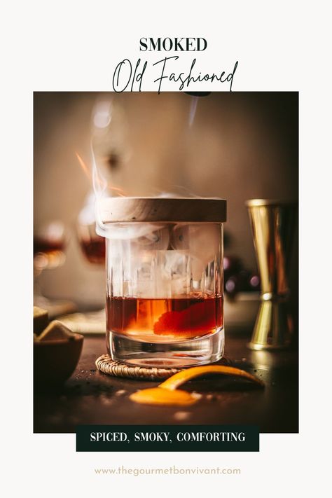 Experience the allure of a smoked old fashioned cocktail, where whiskey, sugar, bitters, and a hint of smoke converge in perfect harmony. Smoked Old Fashioned Cocktail, Smoked Old Fashioned, Smoked Whiskey, Whiskey Old Fashioned, Smoked Cocktails, Bourbon Cherries, Whiskey Brands, Aromatic Bitters, Dark Spirit