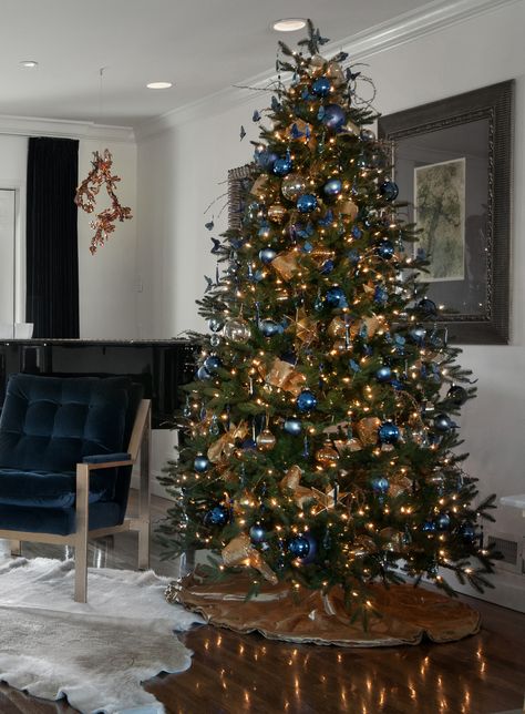 Blue and Gold Christmas Tree with Blue Butterflies. Blue Orange Christmas Tree, Orange And Blue Christmas Tree, Blue And Orange Christmas Tree, Christmas Aesthetic Blue, Gold Christmas Aesthetic, Blue And Gold Christmas Decor, Blue And Gold Christmas Tree, Blue And Gold Christmas, Orange Christmas Tree