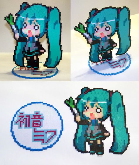 Perler Bead Hachune Miku with Stand by NerdyNoodleLabs on DeviantArt Perler Stand Up, Sakura Miku Pixel Art, Hatsune Miku Perler Beads Pattern, Hatsune Miku Pixel Art Grid, Chibi Perler Beads, Pixel Perler Beads, Miku Perler Bead Patterns, Love Perler Bead Patterns, Hatsune Miku Perler Beads