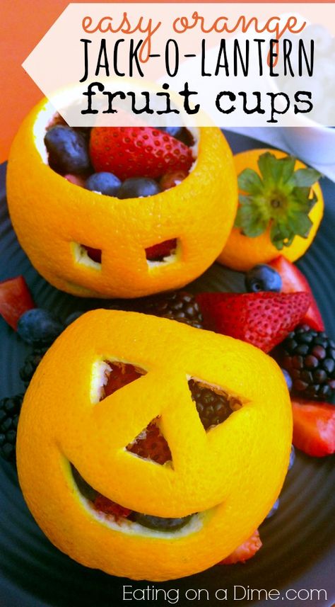 Easy Orange Jack o Lantern Fruit Cups DIY tutorial and recipe!  Ok, I have the cutest Halloween treat for your kids! They are going to love it. It would be super fun for an after school snack or a fun Sunday afternoon treat. I love it because it is healthier too than your traditional treat. You just have to make your kids these cute Orange Jack-O-Lanterns filled with Fruit Healthy Halloween Food, Halloween Snacks For Kids, Kids Halloween Food, Halloween Breakfast, Healthy Halloween Treats, Pumpkin Cups, Appetizers For Kids, Healthy Halloween Snacks, Halloween Fruit