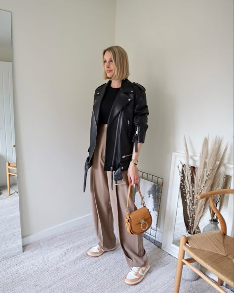 Athleisure Outfits Leather Jacket, Chic Trainers Outfit, Trouser And Leather Jacket, Leather Jacket And Joggers Outfit, Leather Jacket Trousers Outfit, Bikers Jacket Womens Outfit, Leather Jacket Midsize Outfit, Work Outfit Leather Jacket, Oversize Black Leather Jacket Outfit