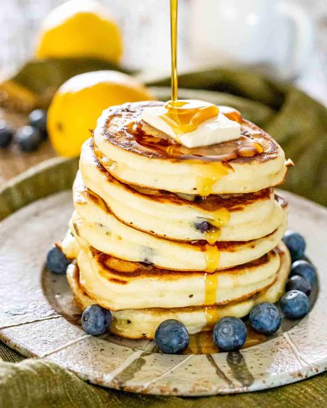 Fluffy Lemon Blueberry Ricotta Pancakes bursting with flavor. A delightful breakfast treat to brighten your mornings. Get the recipe now! #lemon #blueberry #ricottapancakes #recipe Pancake Flavors, Blueberry Ricotta Pancakes, Blueberry Ricotta, Lemon Blueberry Pancakes, Lemon Ricotta Pancakes, Paige Halliwell, Jo Cooks, Ricotta Pancakes, Breakfast Meals