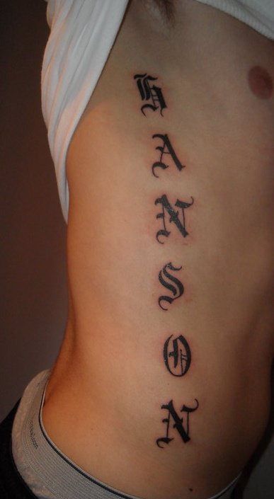 Last name tattoo Vertical Name Tattoo, Name Back Tattoo, Last Name Tattoo, Side Back Tattoos, Last Name Tattoos, Tattoo 2023, Spine Tattoo, Sun Tattoo, Name Tattoo