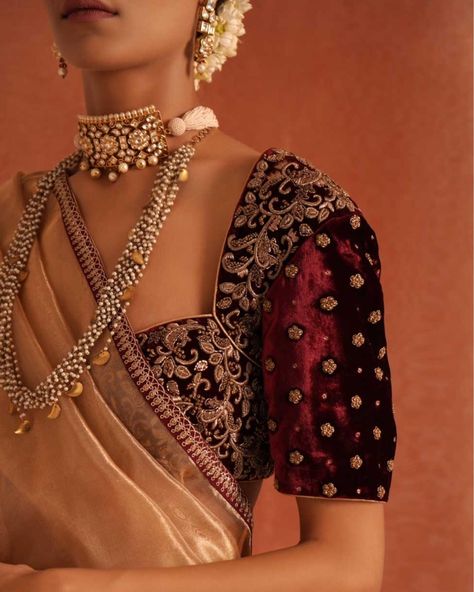 Elevate your elegance with our exquisite gold tissue saree paired with a rich maroon velvet blouse, adorned with intricate Zardosi work. Perfect for any occasion. #RichaAhluwalia #GoldTissueSaree #VelvetBlouse #ZardosiTechnique #TimelessElegance Tissue Gold Saree, Tissue Silk Saree Gold, Festive Gold Tissue Silk Saree, Gold Tissue Silk Saree, Maroon Velvet Blouse, Gold Tissue Saree, Gold Embroidered Pre-draped Tissue Silk Saree, Zardosi Work, Velvet Blouse