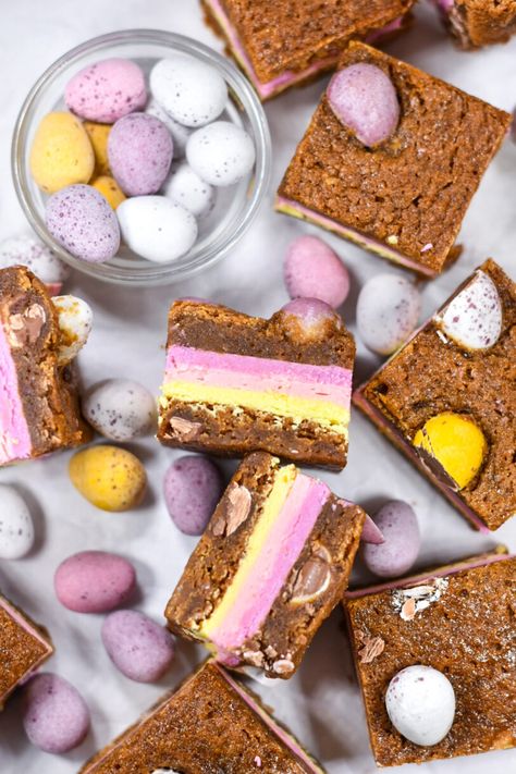 A recipe for Easter blondies featuring crushed Cadbury mini eggs in a blondie base, with colorful layers of white chocolate ganache sandwiched in between. Dessert Recipes For Easter, Cadbury Mini Egg Recipes, Homemade Candy Corn Recipe, Cadbury Egg Recipes, Easter Blondies, Cadbury Recipes, Mini Egg Recipes, Easter Bark Recipe, Easter Candy Recipes