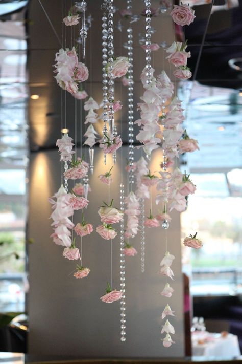 Flower Garland Bedroom Ceiling, Hanging Flowers Installation, Hanging Flowers Ceiling Diy, Ceiling Floral Decor, Spring Dance Decorations, How To Hang Flowers From Ceiling, Flowers On Ceiling, Flower Ceiling Diy, Hanging Flowers Backdrop