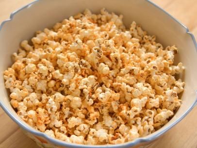 Spicy Sriracha Popcorn Recipe | Ree Drummond | Food Network Spicy Popcorn Recipes, Sriracha Popcorn, Spicy Popcorn, Ree Drummond Recipes, Bbq Spice, Popcorn Recipe, Food Network Canada, Flavored Popcorn, Popcorn Recipes