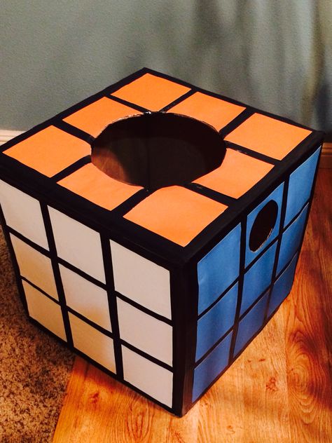 Rubik's Cube Costume, Cardboard Rubix Cube, Rubix Cube Costume, Rubik’s Cube Costume, Rubik’s Cube Party Ideas, Rubiks Cube Costume, Custome Ideas, Board Game Themes, 80s Neon