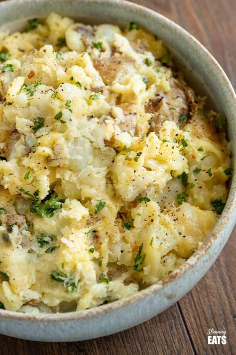 Rustic Garlic and Parmesan Mashed Potatoes (from www.slimmingeats.com) - this easy rustic mash combines skin on Yukon Golden Potatoes with the delicious flavours of garlic and parmesan for the perfect side for any main meal. #potatoes #mash #cheese #slimmingworld #weightwatchers Mashed Potatoes With Skin, Golden Potato Recipes, Garlic Parmesan Mashed Potatoes, Parmesan Mashed Potatoes, Golden Potatoes, Tomato Cucumber Salad, Best Mashed Potatoes, Salad Appetizer, Weight Watchers Smart Points