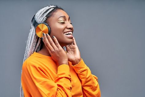 African woman singing while listening to... | Premium Photo #Freepik #photo #black-woman #pretty #afro-woman #beautiful-woman Church Media Design, Woman Singing, Women Laughing, New Background Images, For You Song, Dark Clouds, Girls Music, African Girl, Afro Women