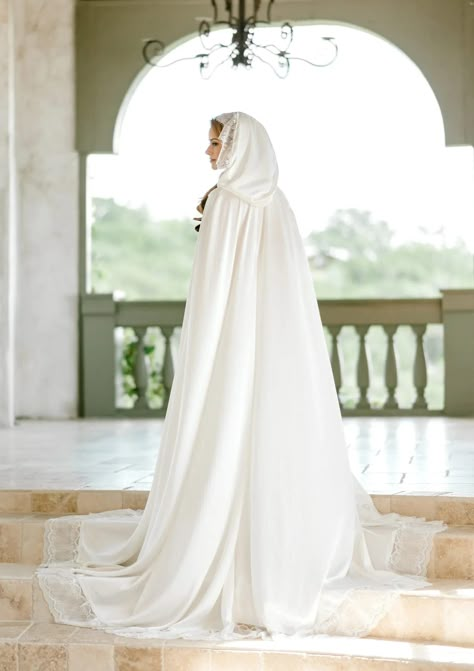 A modern veil alternative, the wedding cape is a chic accessory to rock down the aisle! Shop our favorite bridal capes for 2022 and beyond. Bridal Cloak, Wedding Capelet, Bridal Capes, Wedding Cloak, Cape With Hood, Cape Wedding, Muslimah Wedding Dress, Lace Bridal Robe, White Cape