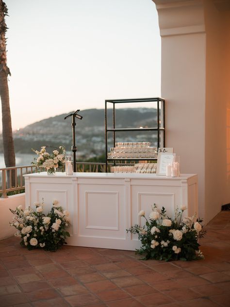 #bar #florals #wedding #intertwinedevents Bar Area Wedding Reception, Wedding Bar Set Up, Wedding Bar Flowers, Bar Florals, Coastal Chic Wedding, August Wedding Flowers, Bar Flowers, Ritz Carlton Laguna Niguel, Neutral Wedding Flowers