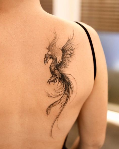 Phoenix Tattoo Design Ideas. Artist:@tattooist_baekyeon #PhoenixTattoo #TattooDesign #GirlsWithInk Phoenix Tattoo Women, Purple Ribbon Tattoos, Phoenix Tattoo Sleeve, Phoenix Back Tattoo, Fenix Tattoo, Wing Tattoo Men, Phoenix Tattoo Feminine, Small Phoenix Tattoos, Phönix Tattoo