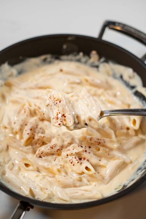 This Spicy Alfredo Sauce recipe gives a spicy kick to the classic Alfredo sauce and is a perfect blend of creamy richness and a hint of heat, thanks to the addition of crushed red pepper flakes. Elevate your pasta game and add a spicy punch to your dinner table with this quick and easy recipe that's sure to spice up your mealtime experience. #contentednesscooking #vegan #spicyalfredo #alfredosauce Spicy Alfredo Sauce, Spicy Alfredo, Fetuccini Alfredo, Classic Alfredo Sauce, Alfredo Sauce Recipe Easy, Italian Pasta Sauce, Carbonara Sauce, Pork Cheeks, Vegetable Dips