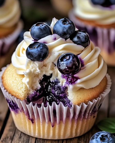 White Chocolate Blueberry Cheesecake Cupcakes - grandmarecipes White Chocolate Blueberry Cheesecake, Chocolate Blueberry Cheesecake, Blueberry Cheesecake Cupcakes, White Chocolate Shavings, Chocolate Blueberry, Chocolate Garnishes, Cupcake Wars, Cupcake Cookie, Cheesecake Cupcakes