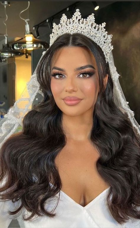 Crown Hairstyles: Sophisticated Elegance for Every Style Veil With Tiara Hair Down, Wedding Hairstyles On The Side, Princess Wedding Hair With Veil, Wedding Hairstyles Crown Tiaras, Bride With Tiara And Veil, Bridal Hair Down With Crown, Bride With Long Hair, Regal Wedding Hair, Bride With Crown And Veil