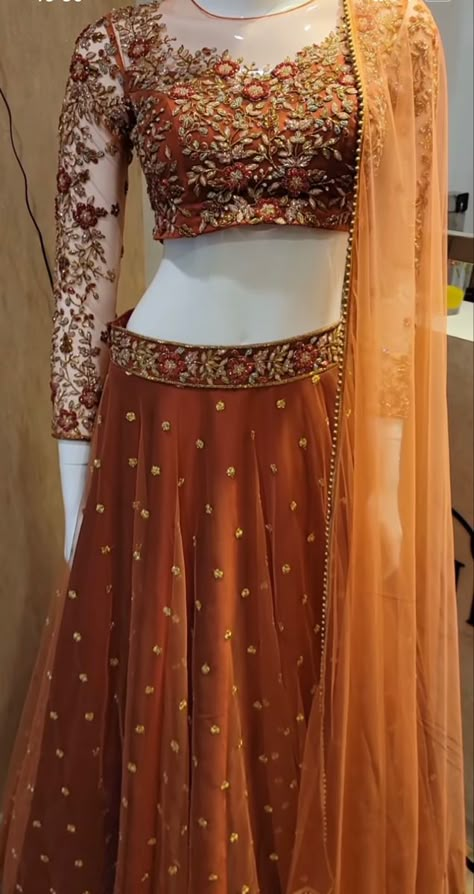 WhatsApp on 9496803123 to customise your handcrafted designer bridal wear with us online. Book your appointment today. We do ship internationally. (Pics for reference) Handmade Lehnga Designs, Gown To Lehenga Ideas, Lehenga Designs Trendy, Embroidery Choli Designs, Designer Dresses Couture, Lengha Blouse Designs, Orange Lehenga, Function Dresses, Simple Lehenga