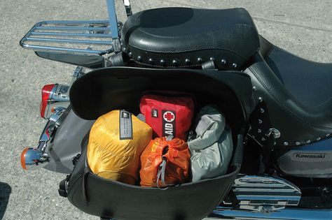 So you've planned where your going to go, but now you have to think of what to bring and where to store it in the limited space on your motorcycle. Well, here are some tips for packing for your upcoming road trip. Motorcycle Road Trip Packing, Motorcycle Trip Packing List, How To Pack For A Motorcycle Trip, Motorcycle Packing Tips, Motorcycle Rain Gear, Motorcycle Storage, Motorcycle Camping, Packing Clothes, Road Trip Snacks