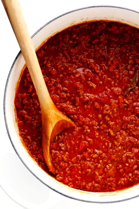 This amazing Bolognese sauce recipe is slow-simmered with a rich tomato base, a delicious blend of beef and pork, and the coziest blend of garlicky herb seasonings.  Serve with pasta, gnocchi, or roasted eggplant and enjoy! | gimmesomeoven.com #bolognese #italian #meat #sauce #marinara #pasta #spaghetti #dinner #beef Sauce For Gnocchi, Best Bolognese Sauce, Beef Bolognese, Homemade Bolognese Sauce, Italian Meat Sauce, Red Wine Recipe, Spaghetti Recipes Easy, Bolognese Sauce Recipe, Ground Beef Recipe