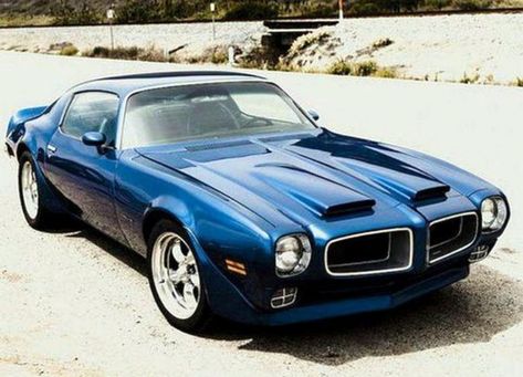 The 1970 Pontiac Firebird Formula 400 hardtop coupe was powered by a 400 cid four-barrel V8 engine developing 265 horsepower. The engine was linked to a Hurst three-speed floor shifter with F70-14 bias-belted blackwall tires and seven-inch wheel rims at all four corners. They had upgraded suspension, front disc and rear drum brakes, vinyl interiors, bucket type seats, concealed wipers, deluxe steering wheel, and dual outside sport mirrors. Exterior visual design cues included twin hood scoops. Pontiac Firebird Formula, Firebird Formula, Lifted Ford, K5 Blazer, Pontiac Firebird Trans Am, Pontiac Cars, Vintage Muscle Cars, Cars Muscle, Vintage Muscle