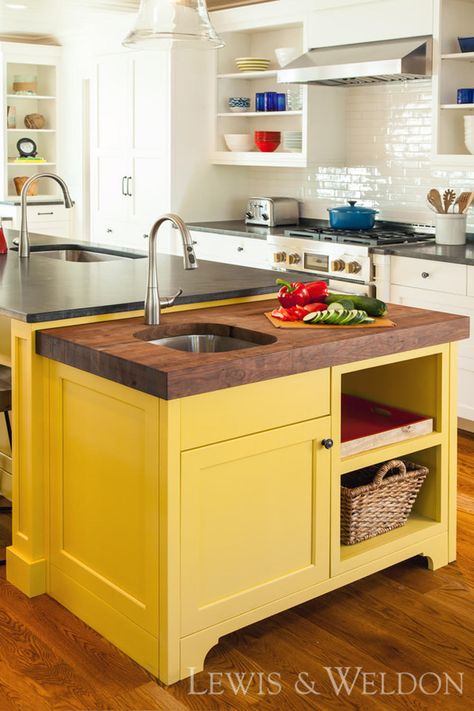 This yellow island in the kitchen adds the perfect pop of color. The island is Bright Yellow by Benjamin Moore, the surrounding cabinetry is Benjamin Moore Frosty White, and the countertop is Honed Jet Mist Granite. This kitchen also features a 3" wooden butcher block end. Vj Kitchen, Cabinets Countertops, Classic Coastal, Laundry Ideas, Happy Kitchen, Cabinetry Design, Custom Kitchens, White Cabinetry, Yellow Kitchen