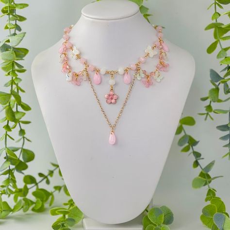 Ayselia Jewelry on Instagram: "Pink Petalite Necklace 🌸✨🧚‍♀️ . . . . . #fairycoreaesthetic #fairycorefashion #fairycorejewelry #fairyaesthetic #fairymagic #fairyvibes #dreamyvibes #fairyforest #fairycosplay #fairytalefashion #cottagecoreaesthetics #cottagecorejewelry #beadedjewelry #cottagecorefashion #cottagecoredream #cottagecoregirl #cottagecorevibes #cottagewitch #gemstonenecklaces #magicjewelry #sparklejewelry #magicaljewelry #crystalnecklace #aestheticlover #fairycorenecklace #beadedneck Fairy Necklace Aesthetic, Cottagecore Girl, Cottagecore Necklace, Cottage Core Jewelry, Fairycore Jewelry, Fantasy Inspo, Fairycore Fashion, Cottagecore Jewelry, Fairy Cosplay