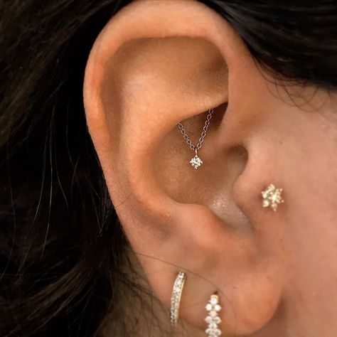 Maria Tash on Instagram: “Our Diamond Drape Threaded Studs are like hidden gems, emerging mysteriously from the new Tash Helix℠ and Tash Hidden Rook℠ piercings.” Hide Piercings, Maria Tash, Cute Piercings, Love My Body, Helix Piercing, Piercing Tattoo, Hidden Gems, Ear Piercings, Body Art