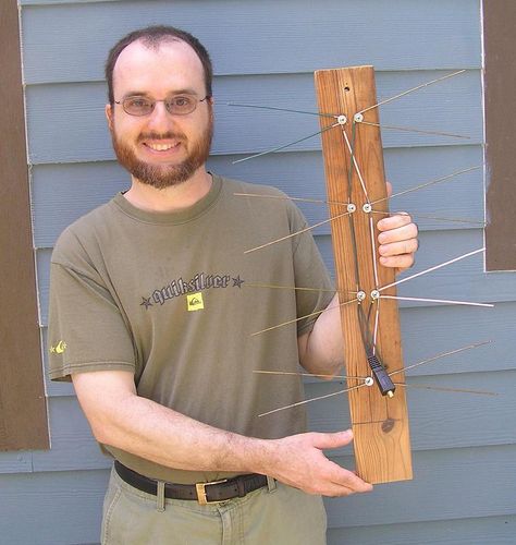 Don Cross holding his home-made HDTV antenna. Watch Tv For Free, Diy Tv Antenna, Home Electrical Wiring, Tv Antennas, Hdtv Antenna, Diy Electrical, Electrical Projects, Electronics Projects Diy, Diy Tv