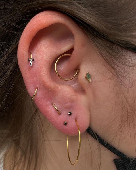 @piercedbyjohn on Instagram: “Started my day off with some stacked lobes and added some gold rings to turn old piercings into something a lil different.” Lobe Stack Piercing, Piercing Both Ears, Stacked Piercings Lobe, Stacked Lobe Piercing Ideas, Triangle Ear Piercing, Stacked Ear Lobe Piercing, Stacked Lobe Ear Piercings, Ear Piercing Stacks, Lobes Piercing