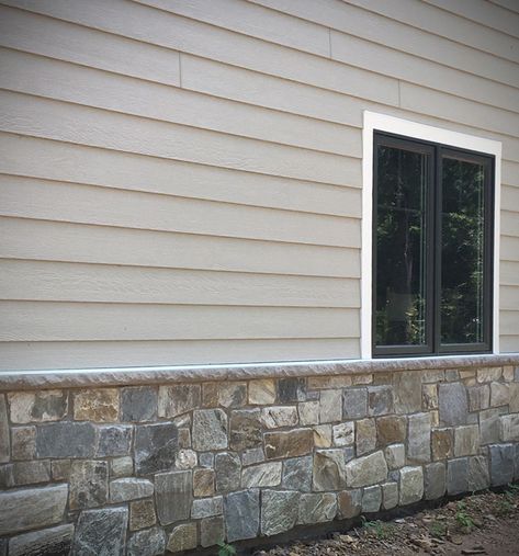 Stone Skirting House Front Porches, Stone Veneer Siding Home Exteriors, Decorative Exterior Wall Ideas, Stone Veneer On Foundation, Half Stone Wall Exterior House, House Skirting Ideas Exterior Stone, Faux Stone Panels Exterior Foundation, Rock On House Exterior, Faux Stone Veneer Exterior