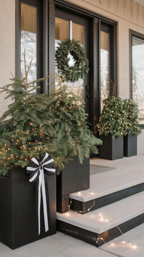 If you love minimalism, these Christmas porch decorating ideas will help you create a sleek and simple holiday display without overdoing it. #MinimalistChristmasDecor #SimpleChristmasPorch #ChristmasPorchIdeas Christmas Porch Decorations, Christmas Porch Decorating Ideas, Holiday Entryway, Winter Planters, Minimalist Christmas Decor, Winter Planter, Porch Decorating Ideas, Porch Decorations, Christmas Porch Decor