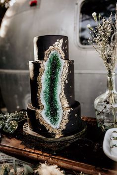 Epic Gilded Gold Black and Emerald Green Geode Wedding Cake!  #weddingcake #cake #wedding #weddingideas #airbus #outdoorwedding #emeraldwedding #geodewedding #macramewedding #colorscheme #weddingtheme #bohowedding #goldwedding #greenwedding #confettidaydreams www.mccormick-weddings.com Virginia Beach Airstream Wedding, Geode Cake Wedding, Geode Wedding, Geode Cake, Black Wedding Cakes, Emerald Green Weddings, Dark Wedding, Cake Trends, Unique Wedding Cakes