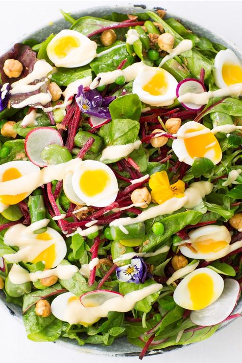 Sally Abé's English garden salad recipe is perfect for a light summer lunch, packed with asparagus, broad beans, peas, radishes and hazelnuts, this fresh salad is finished with delicate soft-boiled quails eggs and a homemade salad cream. English Salad, Broad Bean Recipes, Garden Salad Recipe, Salad Cream, Great British Chefs, Radish Salad, Broad Bean, Homemade Salads, Summer Lunch