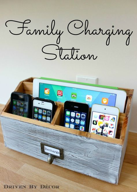 Use this DIY caddy to keep tabs on your family's cellphones by charging all of them at night, in the same spot. Charging Station Kitchen, Electronic Charging Station, Kitchen Desk Areas, Charging Station Organizer, Phone Charging Station, Driven By Decor, Kitchen Desks, Organization Station, Charging Stations