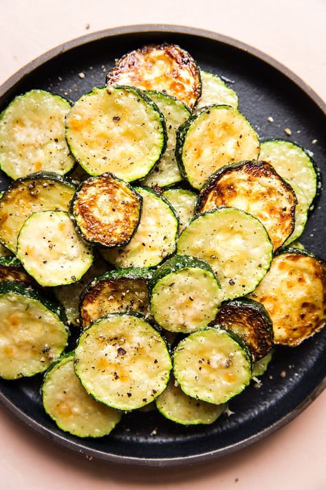 Roasted Zucchini with Parmesan by The Modern Proper || We’re calling it—zucchini is the new cauliflower. And this oven-roasted zucchini with parmesan is the new cauliflower rice. A little crispy, super fast, and ultra-healthy, it really hits the spot. Zucchini With Parmesan, Parmesan Roasted Zucchini, Zucchini Side Dish Recipes, Oven Roasted Zucchini, Zucchini Recipes Baked, Zucchini Side Dishes, Roasted Zucchini, How To Cook Zucchini, The Modern Proper