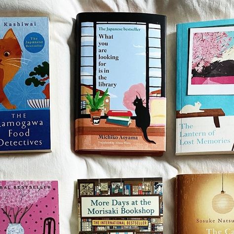 Jenn 📚 Bookstagram on Instagram: "Cats 🤝 Japanese fiction 🌸  I got the right day for translation Thursday 😺 When you see a cat on a cover of a Japanese book, you can expect the story to be cosy, charming, profound and maybe a bit quirky, in some cases with a dash of magical realism like time travel or a talking cat.   Why all the cats you wonder? Well, cats are revered as good luck charms in Japan so it makes sense to feature them in these reads. Also cats have such a lot of character 🐈🐈‍⬛😻  I’m all for these cosy translated Japanese titles which are big comfort reads and often pack more emotion than you expect while immersing yourself into Japanese culture and experiences.   Good news is there’s lots of exciting Japanese cat lit out there and continuing to be released!   In this po Japanese Fiction, Korean Translation, Lost Recipes, Talking Cat, Lost Memories, Japanese Literature, Japanese Titles, Good Luck Charms, Magical Realism